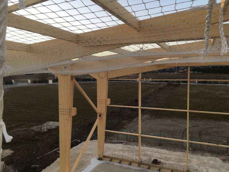 filet de protection sur charpente bois