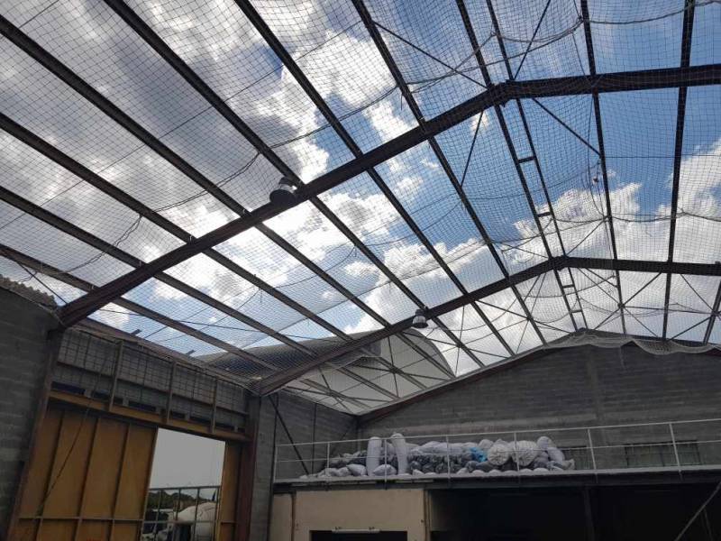 Pose de filets anti-chute homme